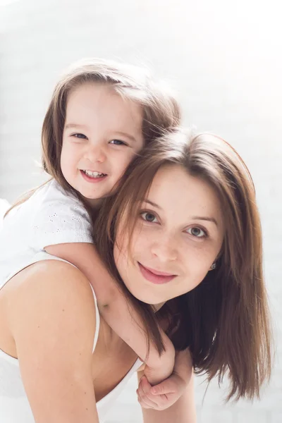 Little girl  playing with mom — Stock Photo, Image