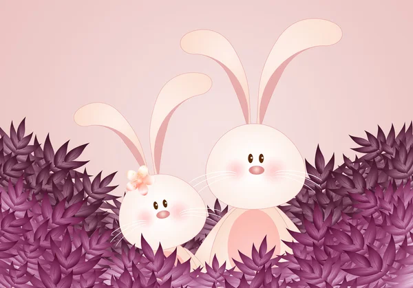 Un par de conejos con hojas —  Fotos de Stock