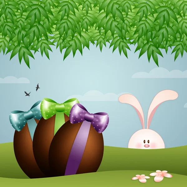Conejito unny con huevos de chocolate para feliz Pascua —  Fotos de Stock