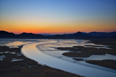 Sazlık alan Suncheon Bay Kore günbatımı