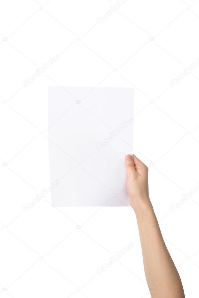 hand holding A4 paper, isolated on white