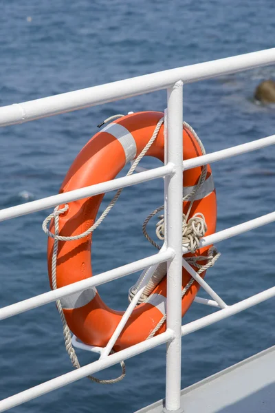 Lifebelt hang on a banister a passenger ship — Stock Photo, Image