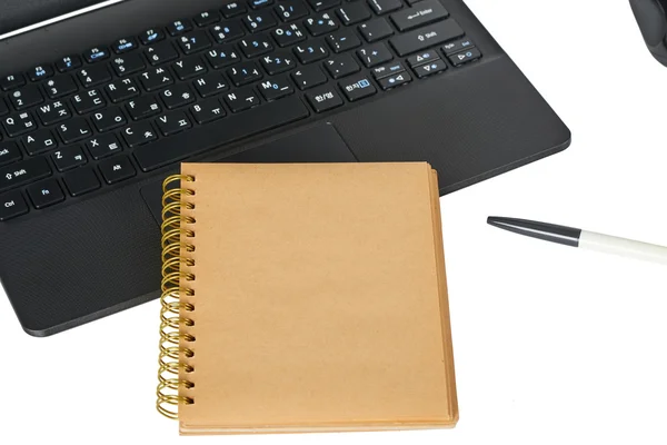 smartphone, laptop computer and memo note with ballpoint pen