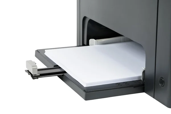 Бумажный лоток у основания лазерного принтера — стоковое фото