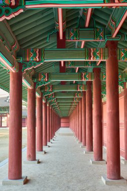 wooden pillars in a row 