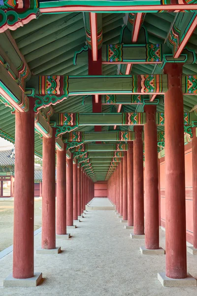 Wooden pillars in a row — Zdjęcie stockowe