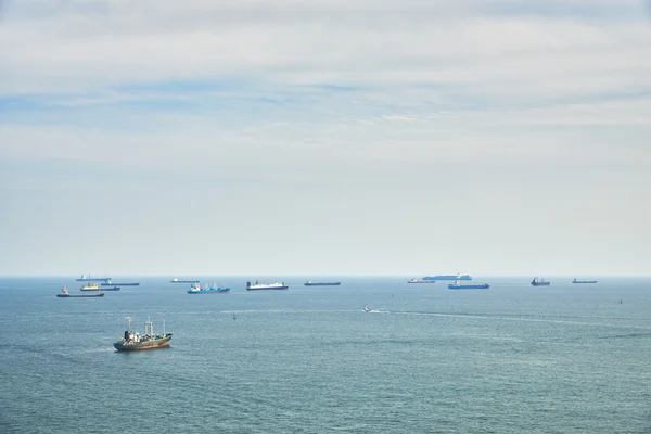 Cargo ship anchored in Busan sea — Stock fotografie