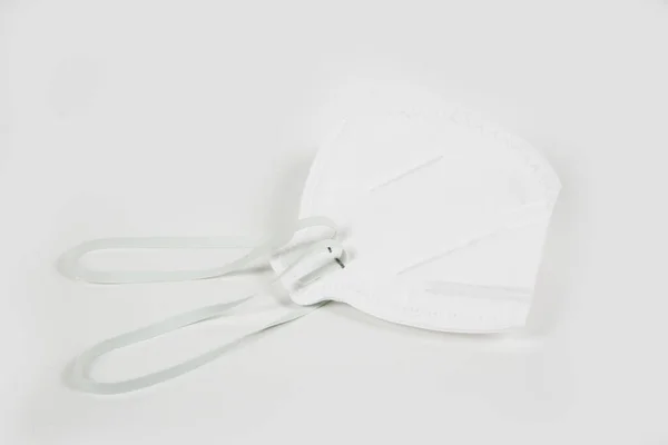 白い背景の医療用マスクのクローズアップ — ストック写真