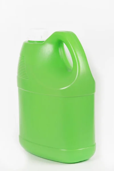 白い背景の上の緑のプラスチック容器 — ストック写真
