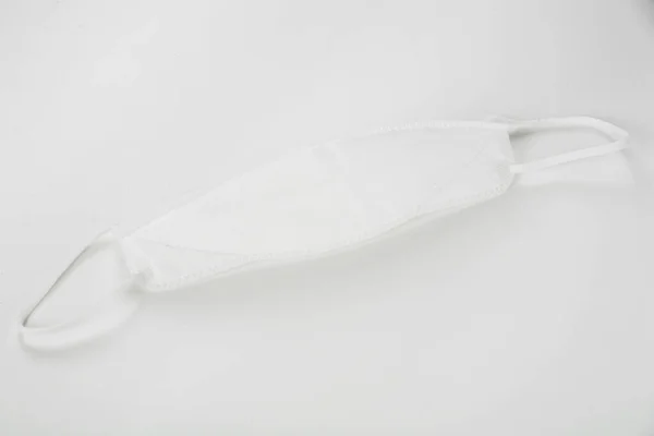 White Disposable Medical Mask Gray Background — 图库照片