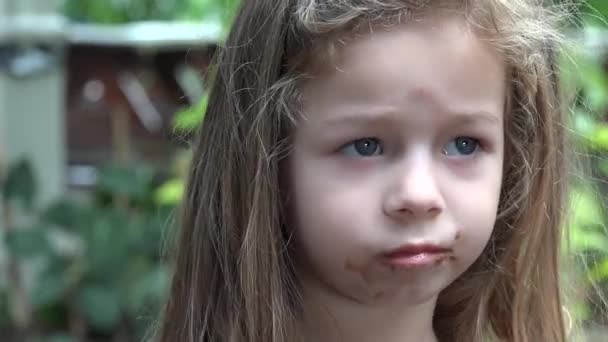 Toddler Girl Eating Chocolate — Stock Video