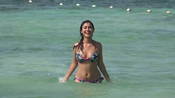 Woman In Bikini Playing In Ocean — Stock Video