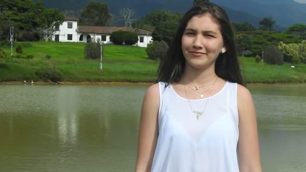 Country Girl Standing By Lake — Stock Video