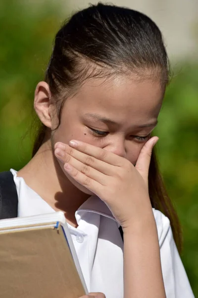 Beautiful Filipina Student Teenager Crying With Textbooks