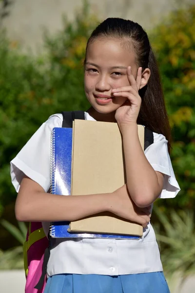 Asian Girl Student Decision Making With Notebooks