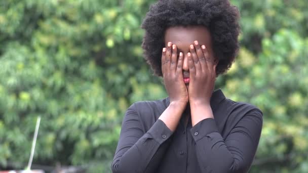 An Ashamed Black Woman Covering Face — Vídeos de Stock