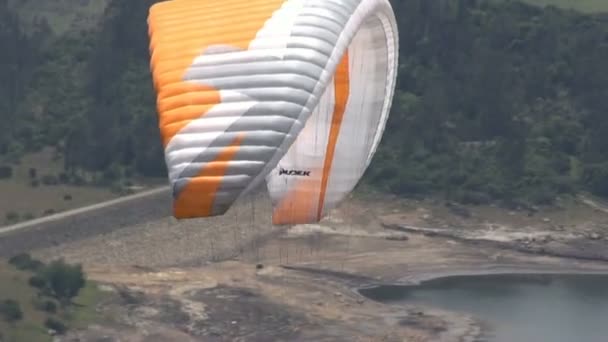 February 24 2014 - Armenia, Colombia - Parasailing over Rural Area — Stock Video