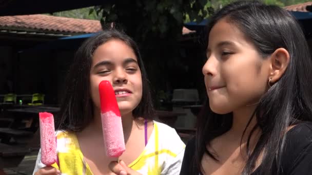 Young Girls Eating Popsicles — Stock Video