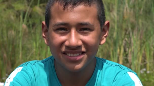 Teenage Boy Smiling Outdoors — Stock Video