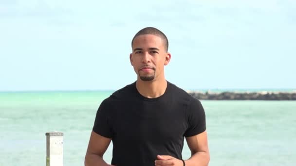 Man Jogging Near Ocean — Stock Video