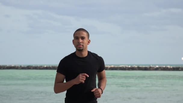 Man Jogging Near Ocean — Stock Video