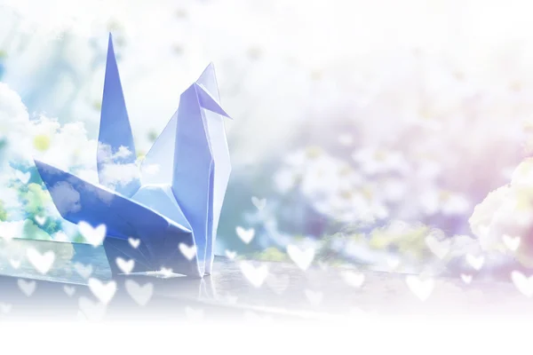 Origami paper crane on the balcony — Stock Photo, Image