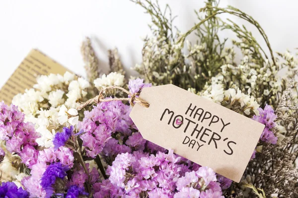 Bouquet of dried flowers with mothers day card — Stock Photo, Image