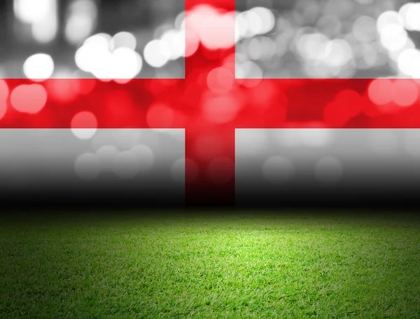 Fotbalové hřiště a bokeh s vlajkou, Anglie — Stock fotografie