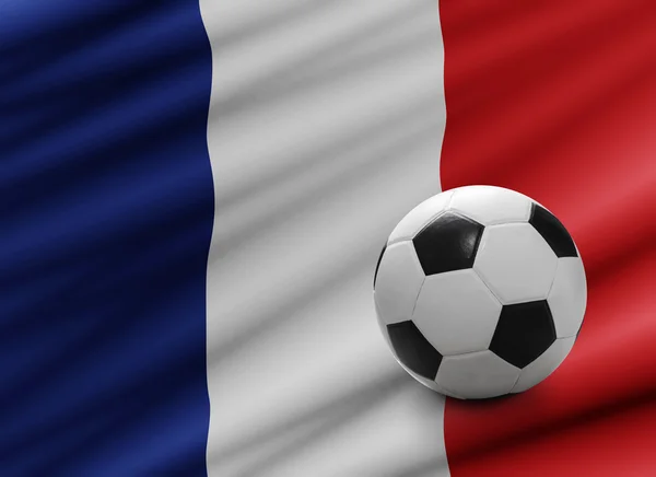 Ballon de football sur drapeau français — Photo