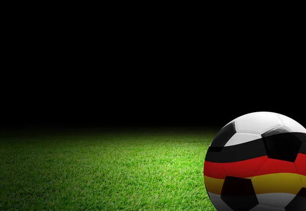 Balón de fútbol con bandera de Alemania en el campo de fútbol — Foto de Stock