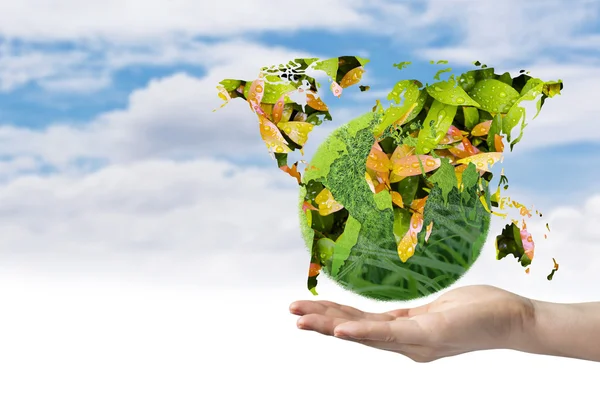 Día de la Tierra concepto de tierra verde en la mano — Foto de Stock