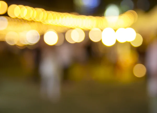 Abstrato luzes embaçadas do mercado noturno — Fotografia de Stock