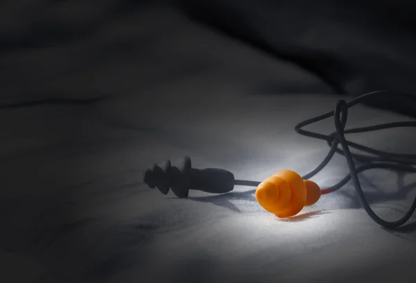 Earplugs on the bedroom — Stock Photo, Image