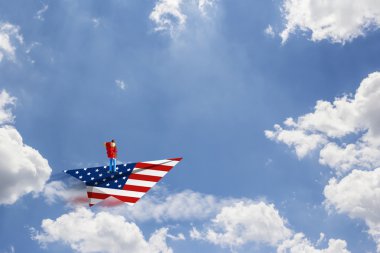 Backpacker kağıt Amerikan uçak üzerinde