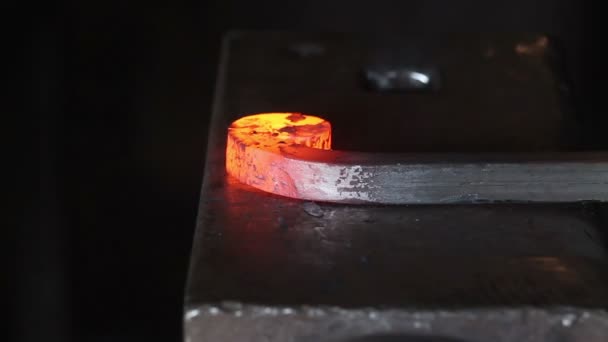 Forging hot metal in smithy — Stock Video