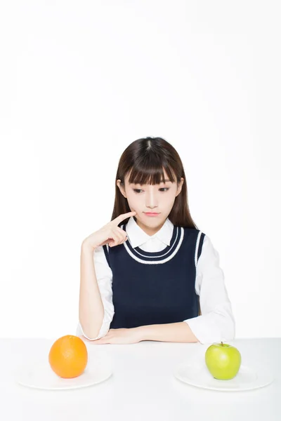 Girl sitting in a quiet room — Stock Photo, Image