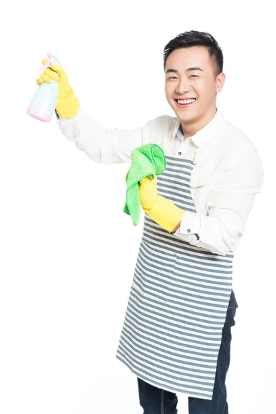 Young man cleaning on white — Stock Photo, Image