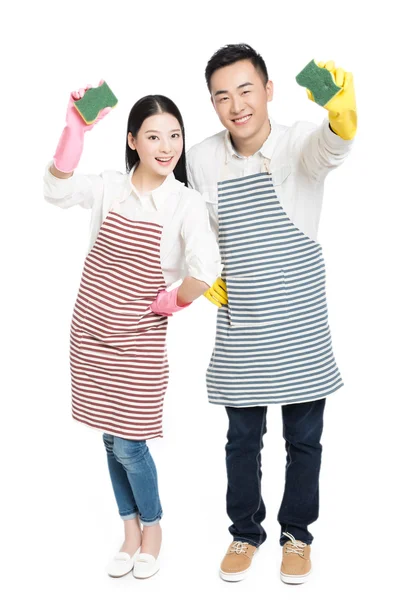 Man en vrouw met reinigingsmiddelen — Stockfoto