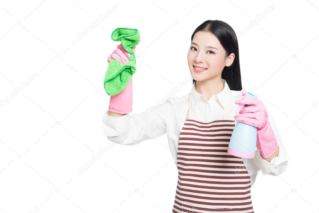 young woman cleaning on white