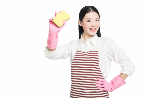 Young woman cleaning on white — Stock Photo, Image