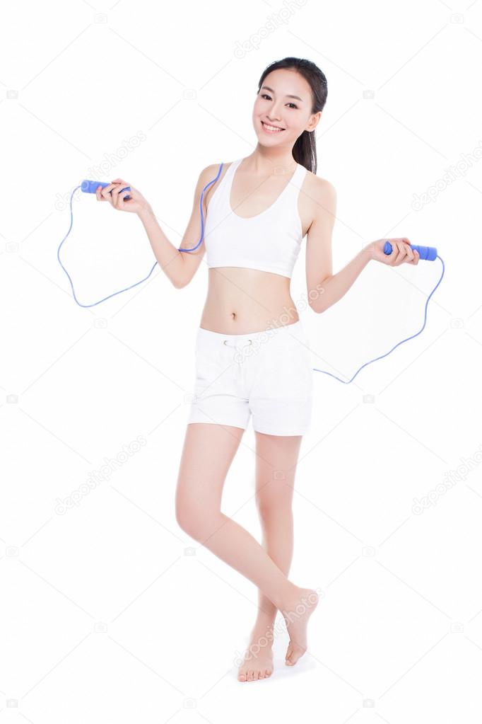 young girl jumping rope, white background