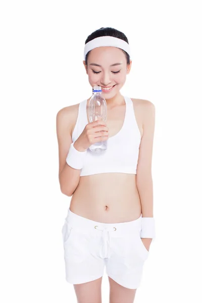 Healthy asian woman with towel and water bottle — Stock Photo, Image