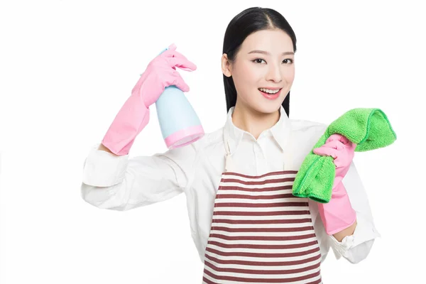 Young woman cleaning on white — Stock Photo, Image