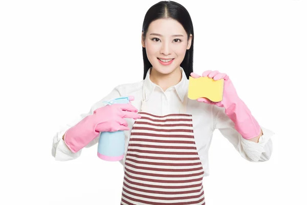 Young woman cleaning on white — Stock Photo, Image