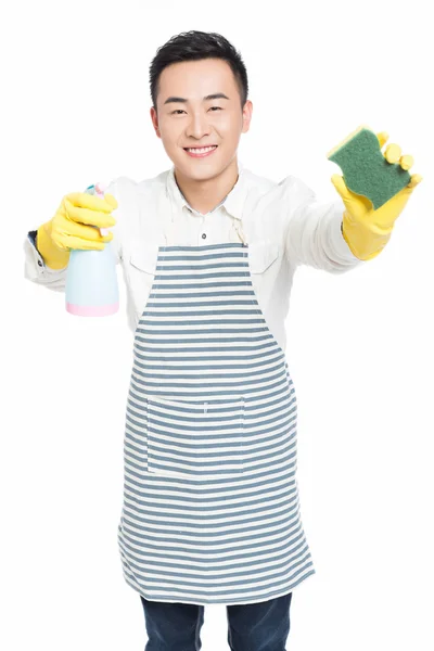 Young man cleaning on white — Stock Photo, Image