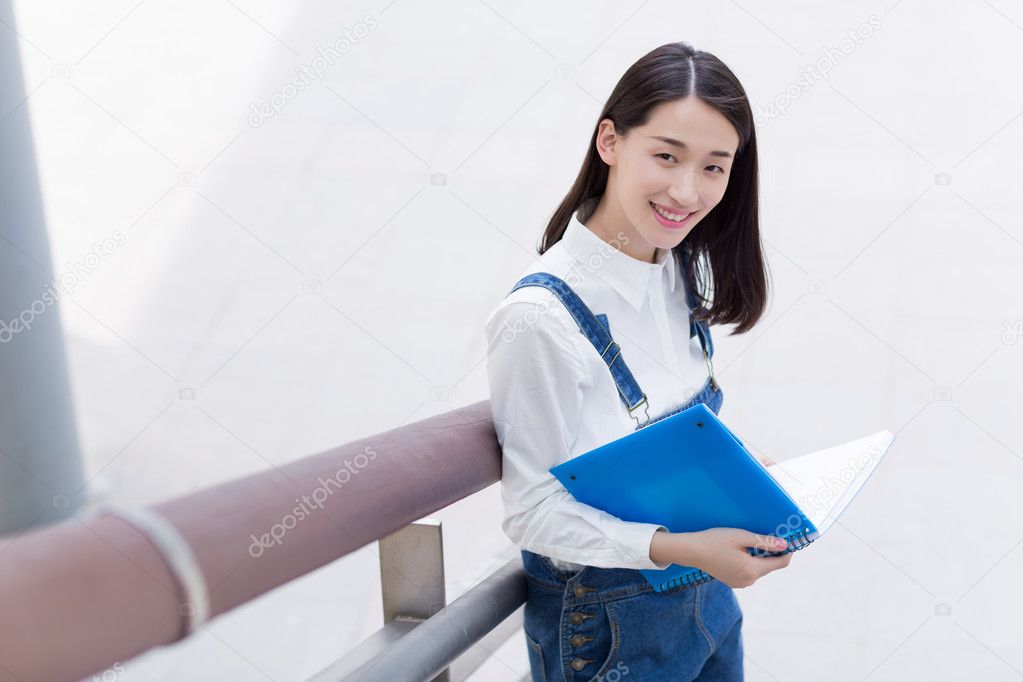 girl reading outdoors