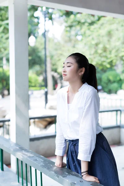 Girl standing outdoors — Stock Photo, Image