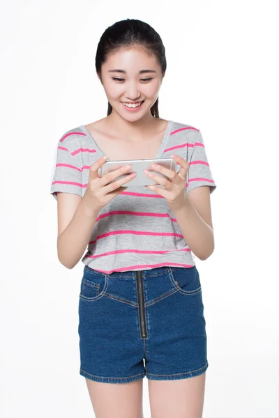 Pretty girl playing games — Stockfoto