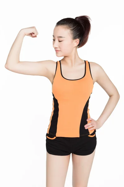 Tam kobieta biceps — Zdjęcie stockowe