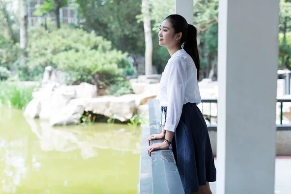 Girl standing outdoors — Stock Photo, Image